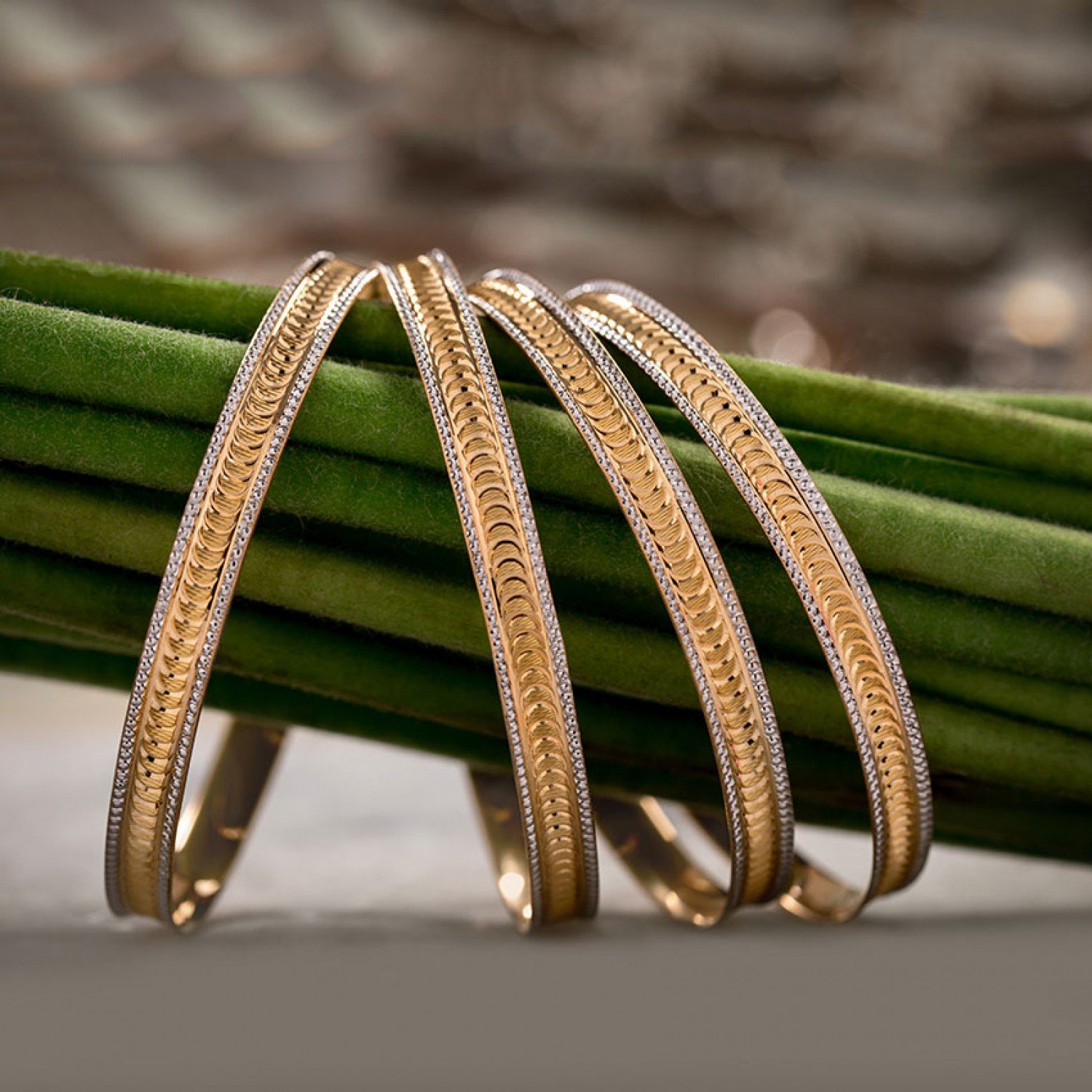 Enigmatic Charm Gold Bangles